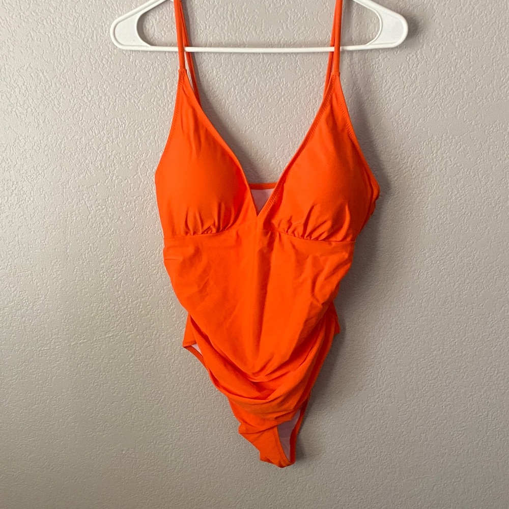 Bright orange one piece.